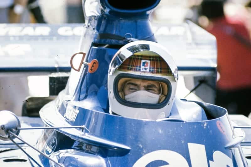 Jackie Stewart sits in his Tyrrell at the 1973 French Grand Prix.