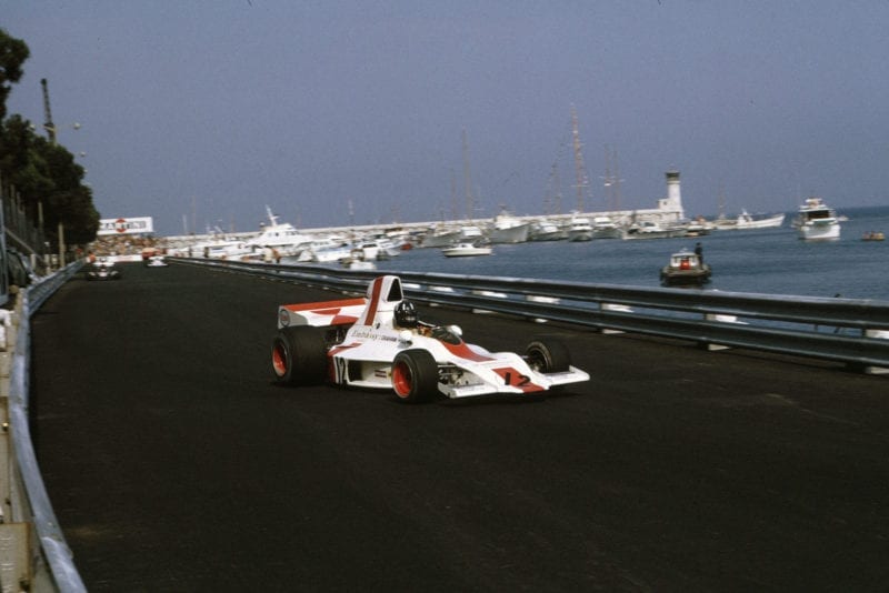 Graham Hill's Embassy Racing Shadow passes the harbour at the 1973 Monaco Grand Prix.