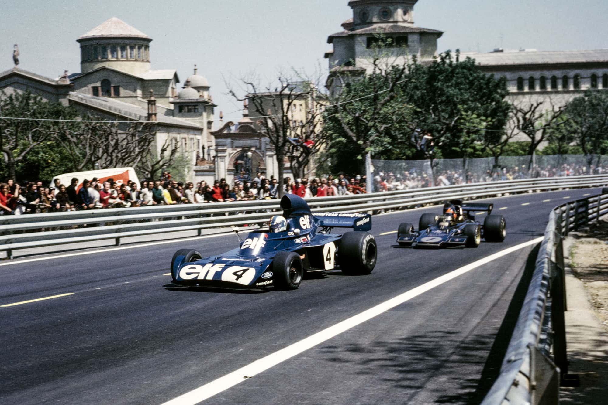 Emerson Fittipaldi chases Stewart at the 1973 Spanish Grand Prix, Montjuïch Park.