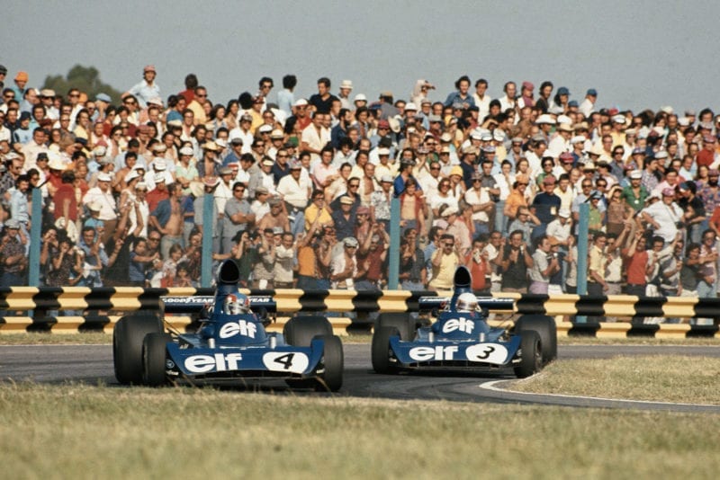 Depailler leads Tyrrell team-mate Scheckter at the 1974 Argentine Grand Prix, Buenos Aires.