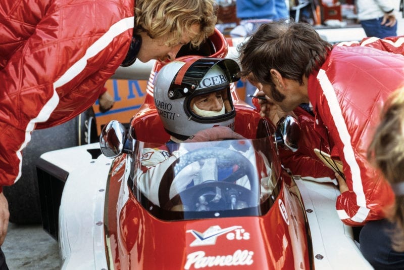 Mario Andretti sits in his Parnelli before the 1974 Canadian Grand Prix, Mosport.
