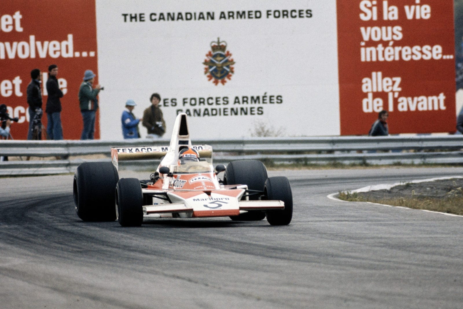 Emerson Fittipaldi (McLaren) racing at the 1974 Canadian grand Prix, Mosport.