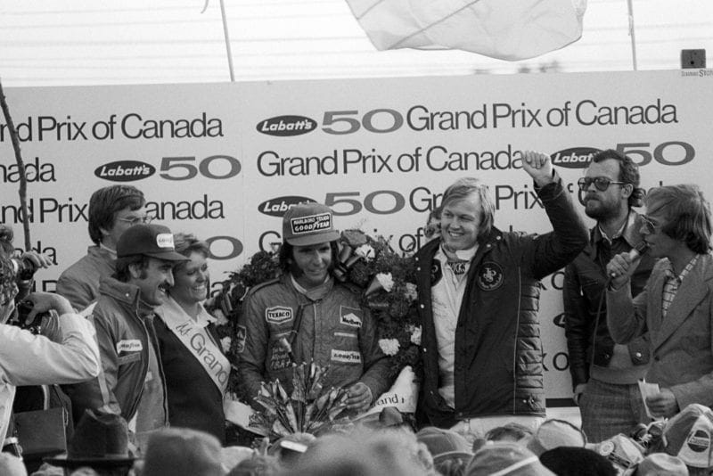 Emerson Dittipaldi celebrates winning the 1974 Canadian Gran Prix, Mosport.