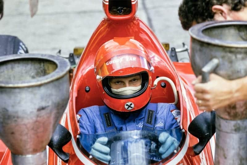 Niki Lauda sits in his Ferrari at the 1974 German Grand Prix.
