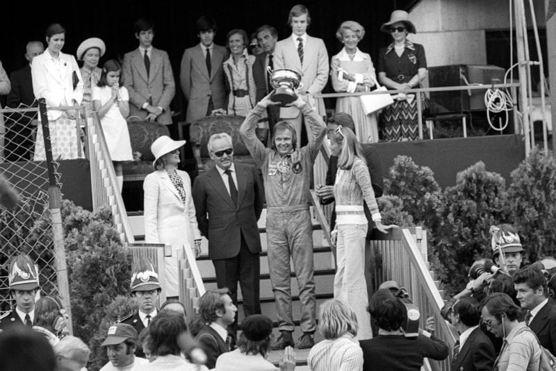 Ronnie Peterson holds the trophy aloft at the 1974 Monaco Grand Prix.