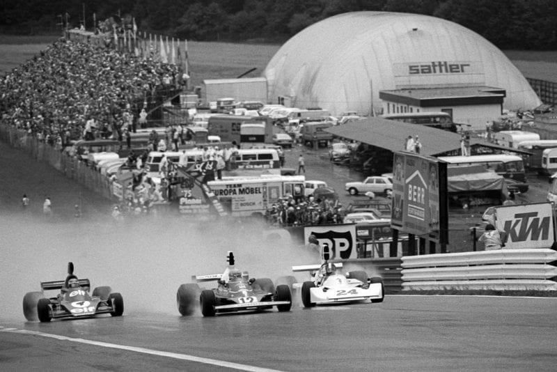 Niki Lauda (Ferrari) heads the pack into the first corner of the 1975 Austrian Grand Prix, Osterreichring.
