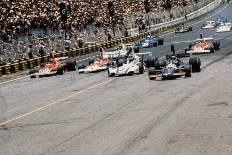 (From right) Jean-Pierre Jarier heads Carlos Pace, Emerson Fittipaldi and Niki Lauda at the 1975 Brazailian Grand Prix, Interlagos.