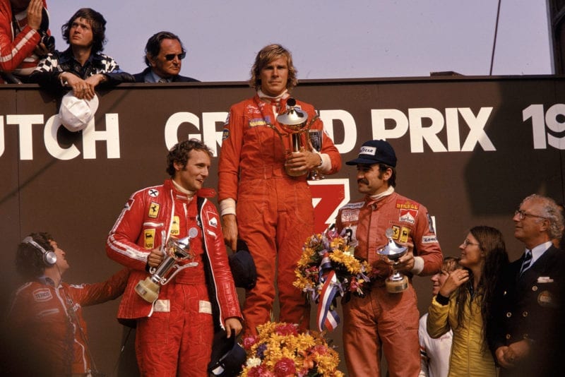 James Hunt (Hesketh) stand son the podium after winning the 1975 Dutch Grand Prix, Zandvoort.
