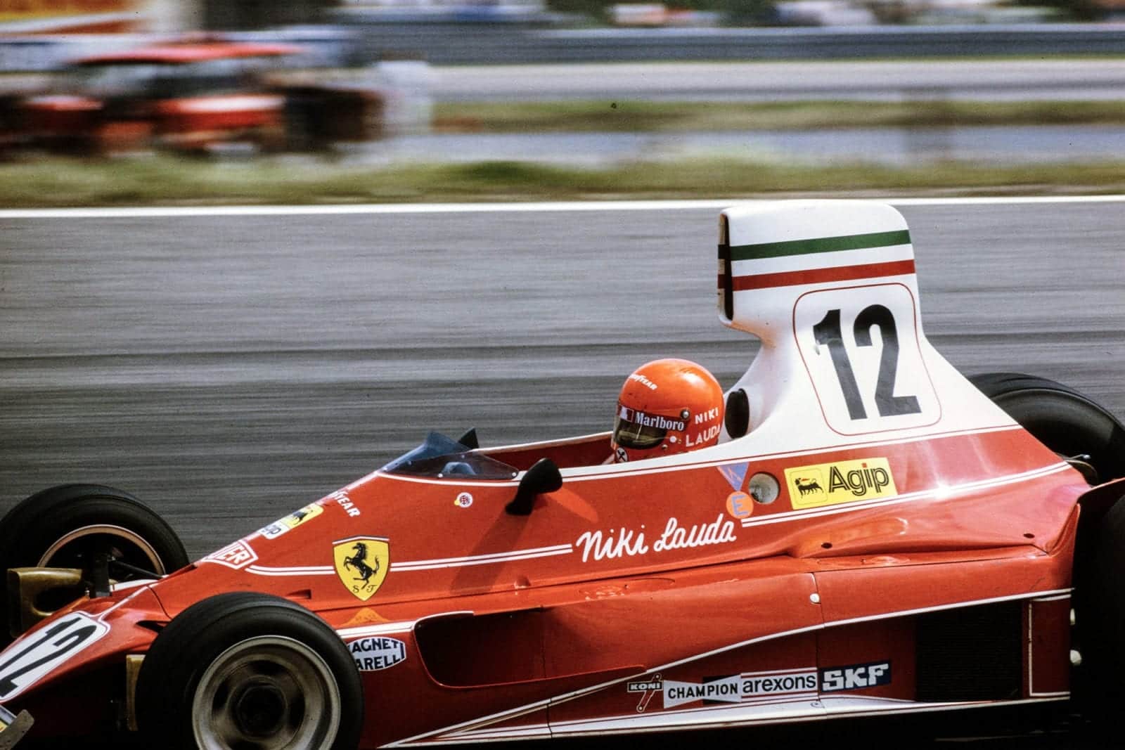 Niki Lauda (Ferrari) throws his car into a corner at the 1975 Swedish Grand Prix.