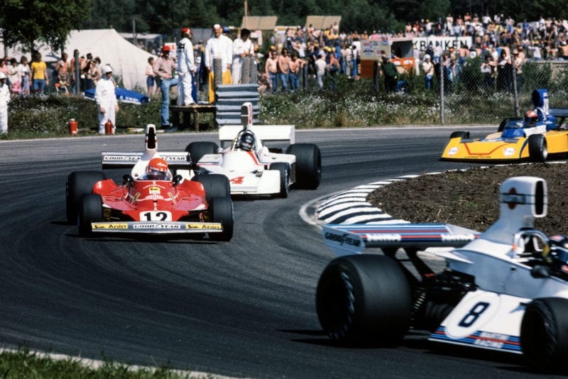 Carlos Pace (Brabham) leads Niki Lauda (Ferrari) and James Hunt (Hesketh).
