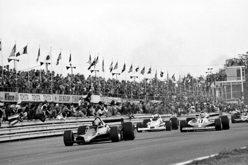 Mario Andretti (Lotus) leads at the start of the 1978 United States Grand Prix East, Watkins Glen.