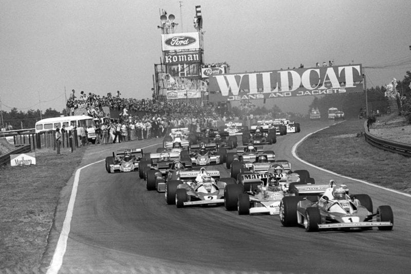 The field heads into Turn 1, 1976 Belgian Grand Prix, Zolder.