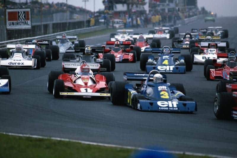 The field heads to Turn One at the start of the of the 1976 German Grand Prix, Nürburgring.