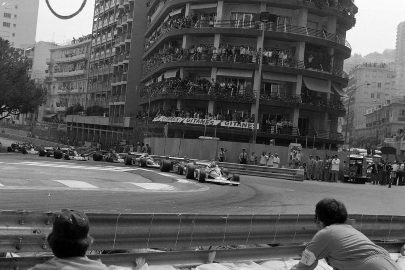 The field heads into Saint Devote at the start at the 1976 Monaco Grand Prix.
