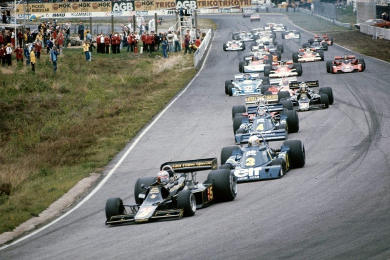 Mario Andretti (Lotus) leads at the start of the 1976 Swedish Grand Prix.