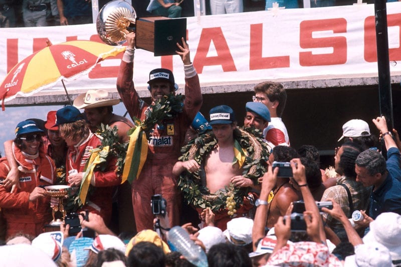 Carlos Reutemann celebrates his win at the 1977 Brazilian Grand Prix, Interlagos.