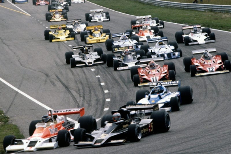 James Hunt sneaks his McLaren ahead at the start of the 1977 Dutch Grand Prix, Zandvoort.