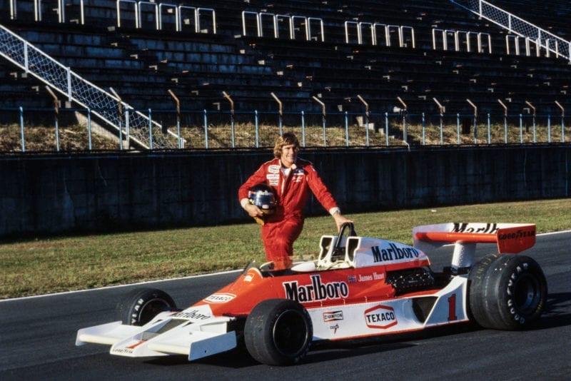 James Hunt poses with his McLaren at the 1977 Japanese Grand Prix, Fuji.