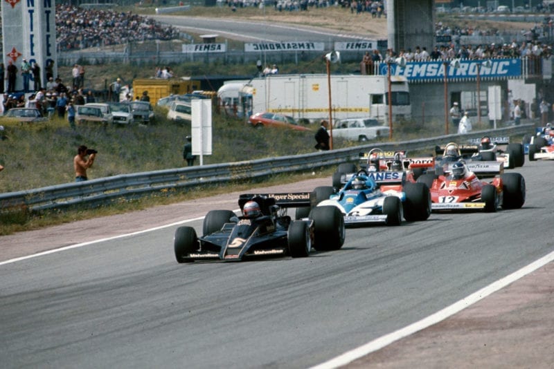 Mario Andretti (Lotus) takes the lead at the start of the 1977 Spanish Grand Prix, Jarama.