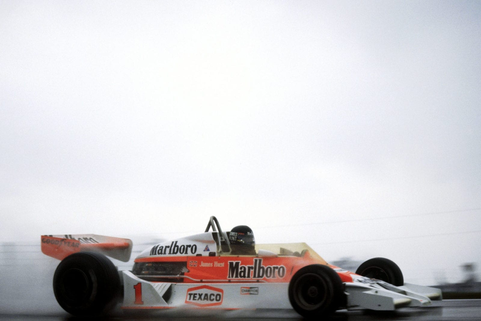 james Hunt (McLaren) driving in wet conditions at the 1977 United States Grand Prix East, Watkins Glen.