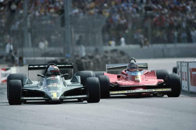 Mario Andretti keeps his Lotus ahead of the Ferrari of Gilles Villeneuve at the 1979 United States Grand Prix, Long Beach.