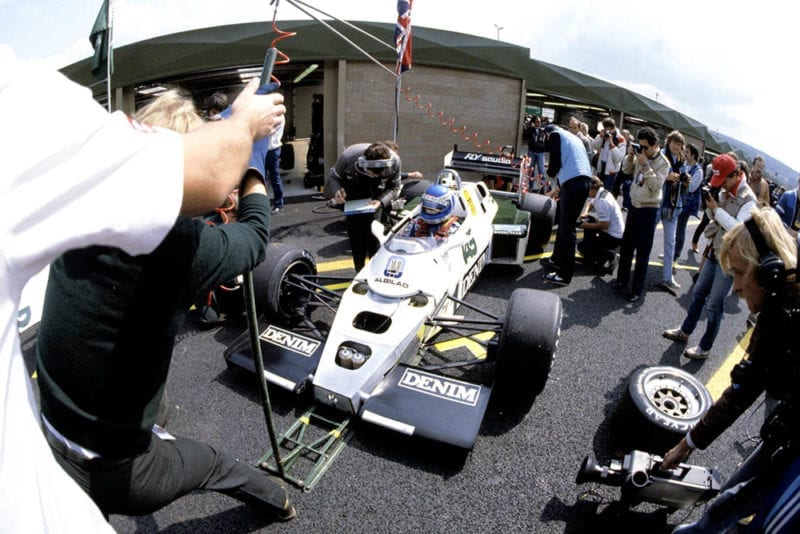 Keke Rosberg with his Williams FW08C-Ford Cosworth in the pits.