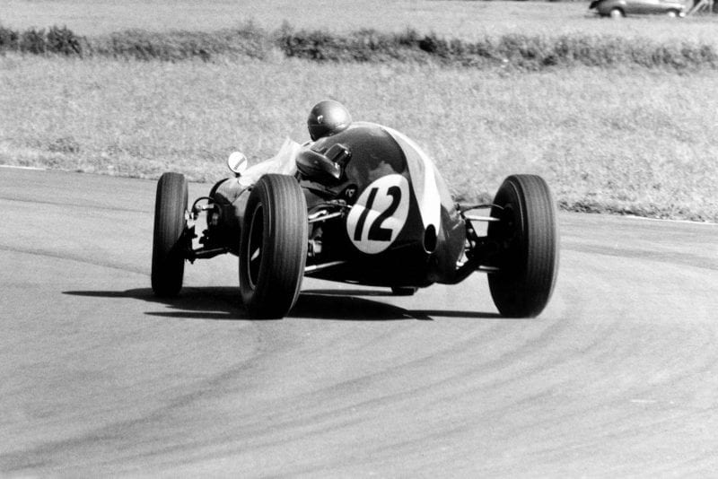 Jack Brabham pushing the Cooper T51-Climax hard.