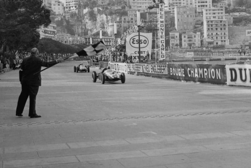 Jack Brabham takes the chequered flag for the win
