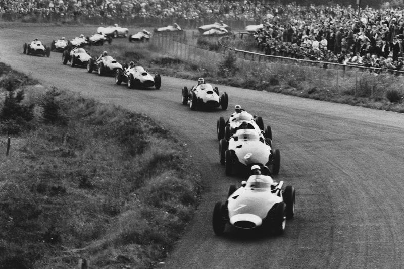 Stirling Moss driving a Vanwall leads Tony Brooks also in a Vanwall at the start of the race.
