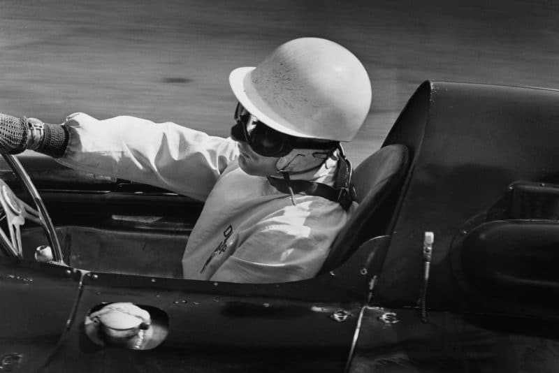 Stirling Moss at the wheel of his Cooper T51-Climax.