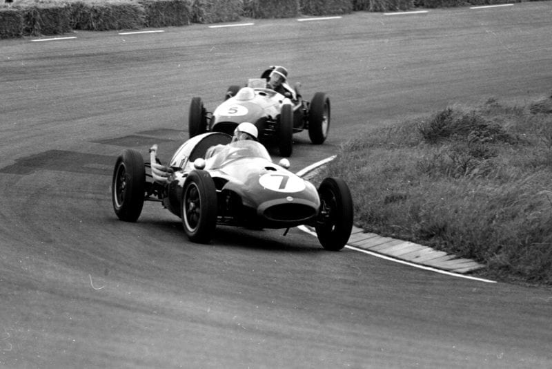 Roy Salvadori driving a Cooper T45 Climax, leads Mike Hawthorn in his Ferrari 246.