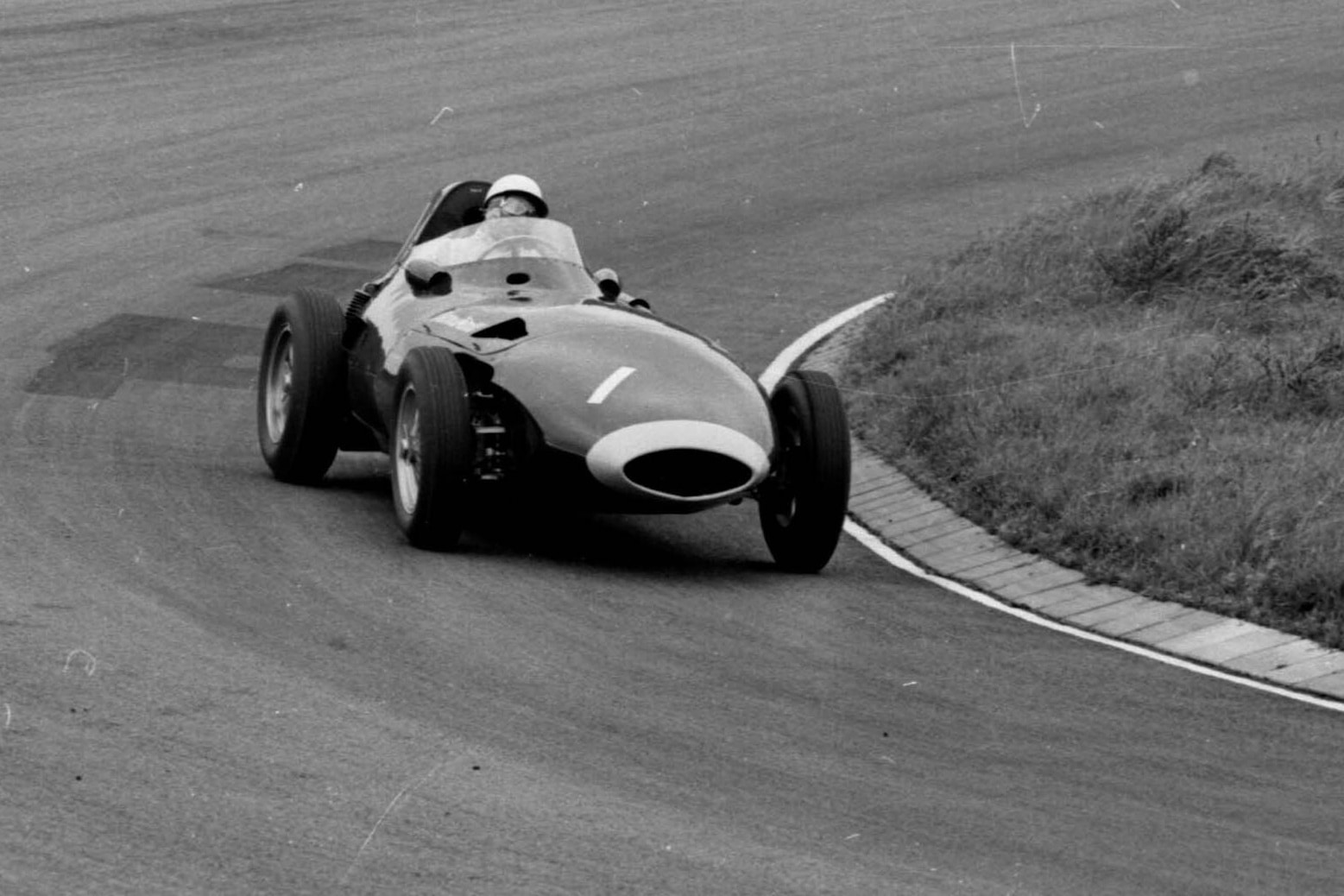 Stirling Moss in 1st postion driving the Vanwall