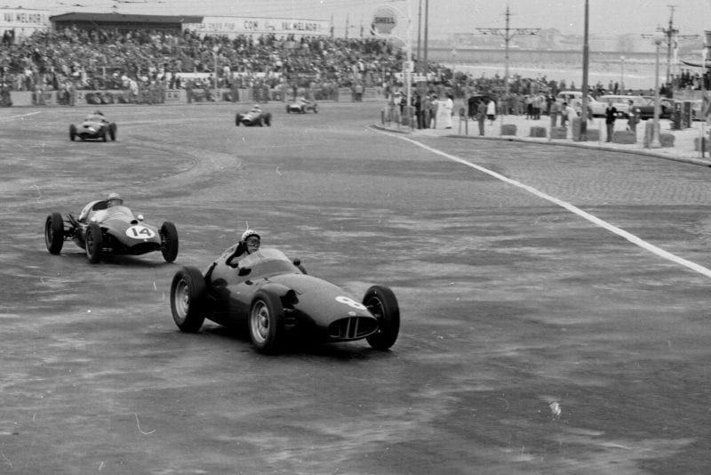 Jean Behra in his BRM P25 leads Jack Brabham driving a Cooper T45-Climax.