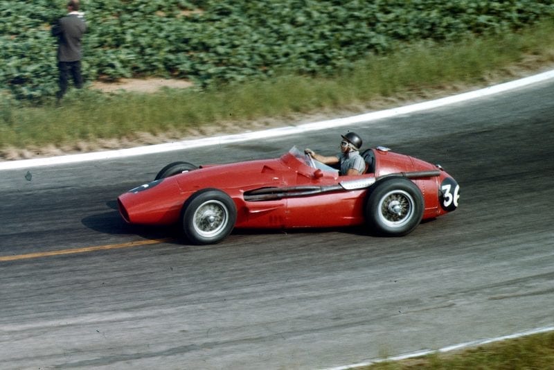 Phil Hill driving his Maserati 250F to 7th place.