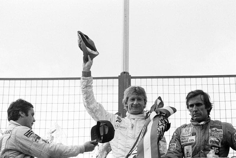 Winners podium , Left to right; Alan Jones in 2nd, Jean-Pierre Jabouille race winner and Carlos Reutemann, 3rd.