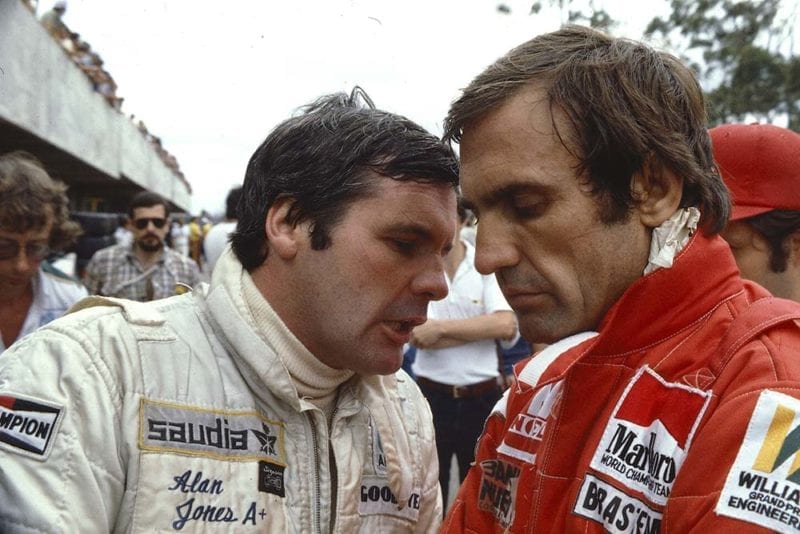 Alan Jones chats with team mate Carlos Reutemann (Both Williams Ford).