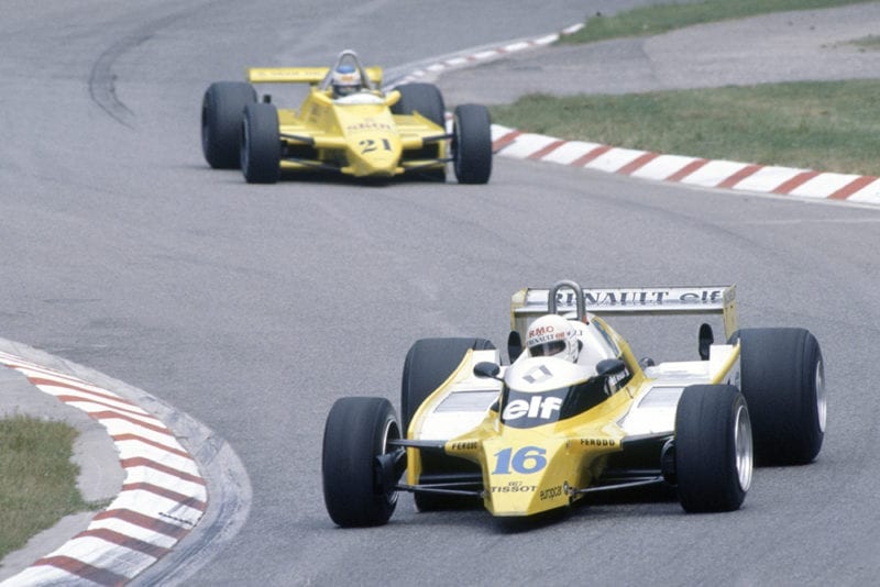 Rene Arnoux (Renault RE20) leads Keke Rosberg (Fittipaldi F8-Ford Cosworth).