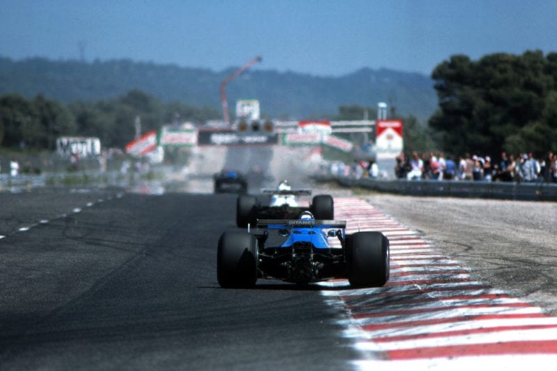 Didier Pironi in his Ligier JS11/15 chases Alan Jones in a Williams FW07B and leader Jacques Laffite Ligier JS11/15.