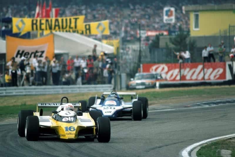 Rene Arnoux in a Renault RE20, leads eventual winner Jacques Laffite in his Ligier JS11/15.