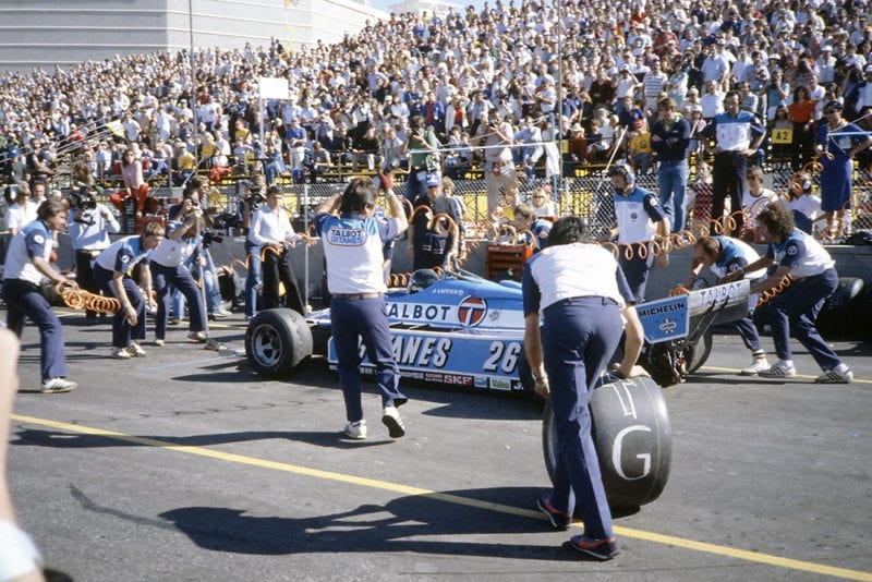 Jacques Laffite (Ligier JS17-Matra) in the pits.