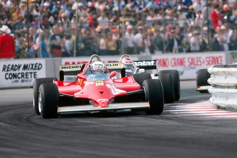 Didier Pironi (Ferrari 126CK) leads Nelson Piquet (Brabham BT49C) and Gilles Villeneuve (Ferrari 126CK).