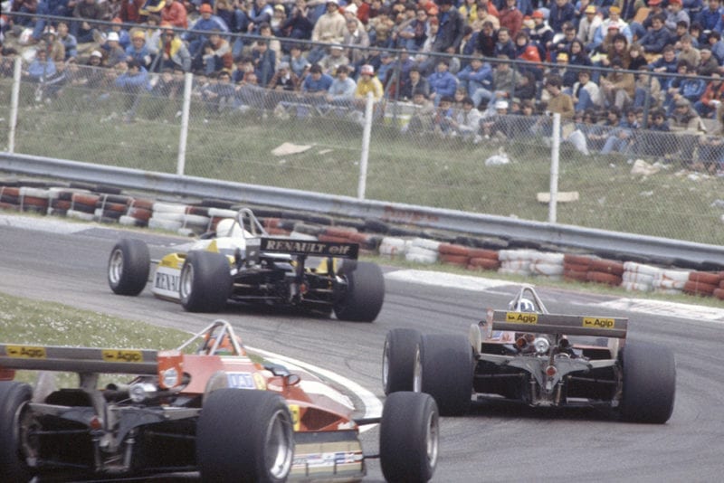 Rene Arnoux (Renault RE30B) leads Didier Pironi and Gilles Villeneuve (both Ferrari 126C2).