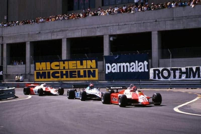 Bruno Giacomelli (Alfa Romeo 182) leads Eddie Cheever (Ligier JS17) and Niki Lauda (McLaren MP4B).
