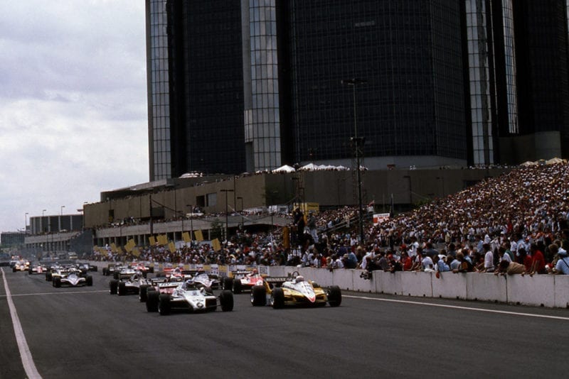 Third on the grid, Keke Rosberg (Williams FW08) pulls alongside Alain Prost (Renault RE30B) at the start of the race.