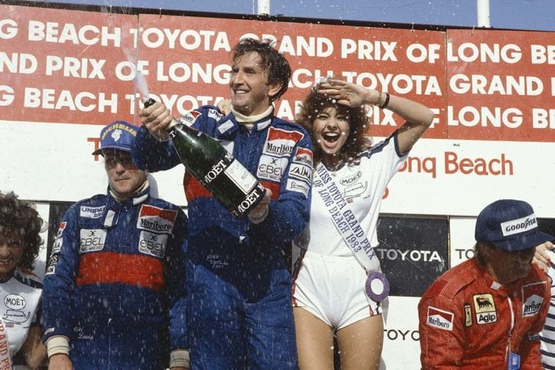 Winner John Watson, Niki Lauda 2nd position and Rene Arnoux 3rd position on the podium.