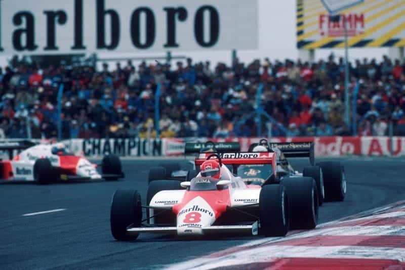 The McLaren of Niki Lauda leads the Lotus of Elio de Angelis, the Tyrrell of Michele Alboreto and the Alfa Romeo of Mauro Baldi.