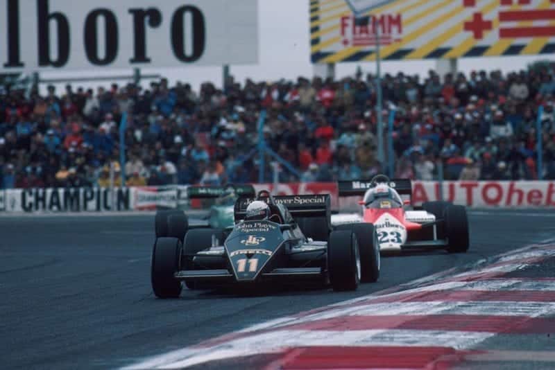 The Lotus of Elio de Angelis leads the Alfa Romeo of Maurro Baldi and the Tyrrell of Michele Alboreto