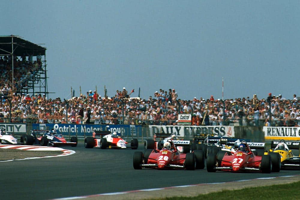 The two Ferrari's of Rene Arnoux, left, and Patrick Tambay lead the pack from a front row start.
