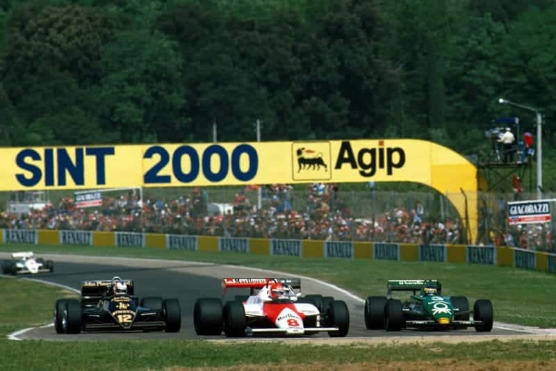 The McLaren of Niki Lauda leads the Lotus of Nigel Mansell, left, and the Tyrrell of Michele Alboreto.