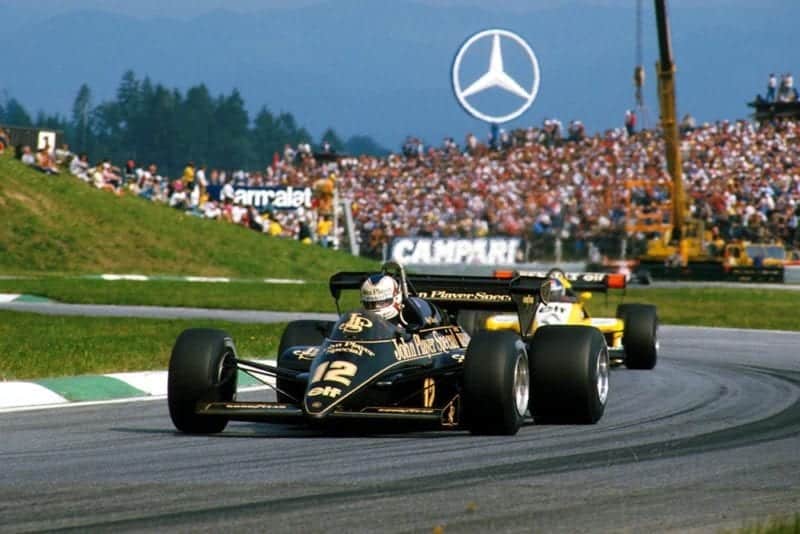 Ayrton Senna's Toleman, leading Elio de Angelis in his Lotus.
